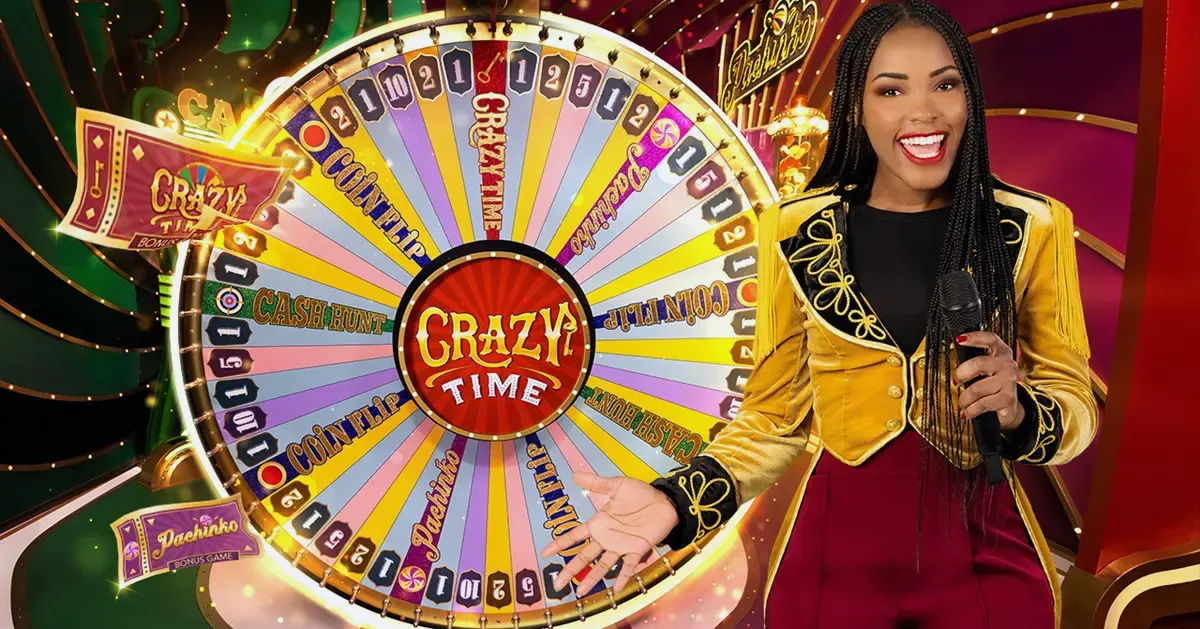Promotional Crazy Time image showing a brightly lit multicolour game wheel with bonus segments (Coin Flip, Cash Hunt, Pachinko), and a smiling female host in a gold jacket holding a microphone and gesturing toward the wheel.