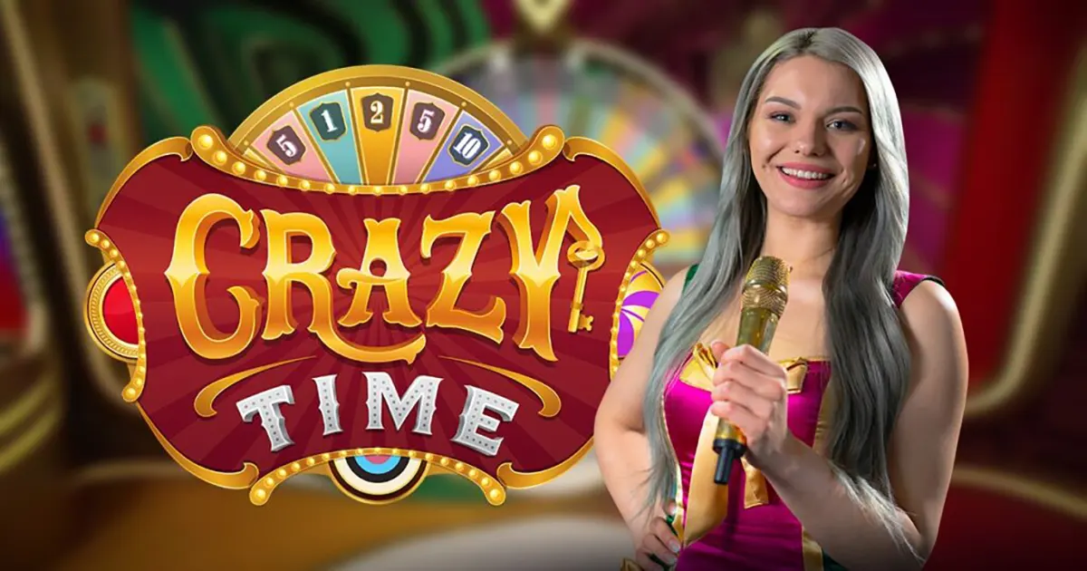 Promotional Crazy Time image featuring the large “CRAZY TIME” logo in front of a blurred game wheel, with a smiling female host holding a gold microphone and wearing a pink-and-gold costume.
